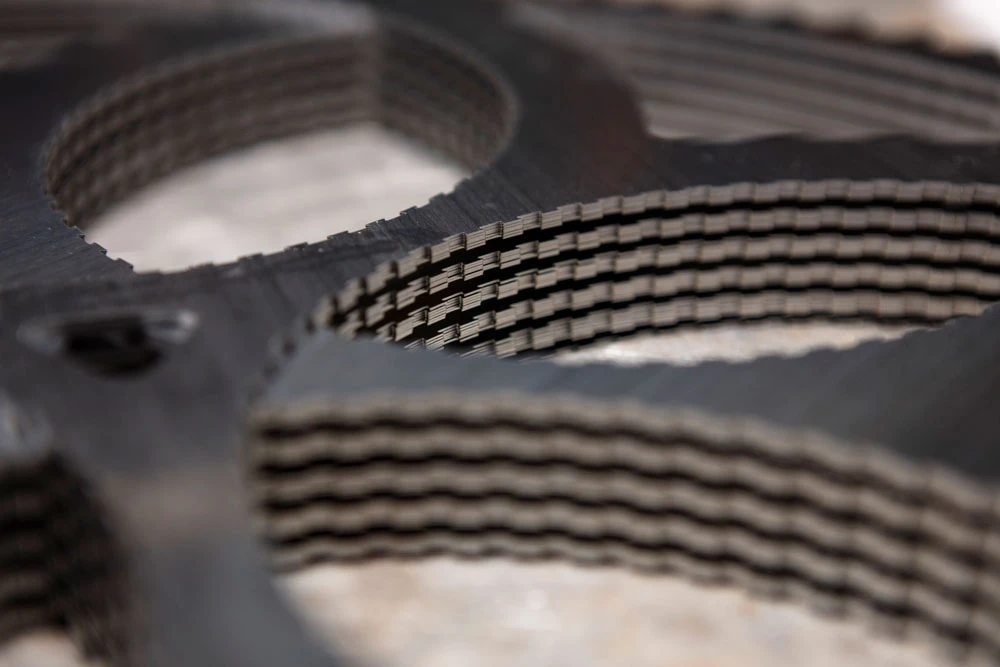 Stack of thin lapping carriers showing the real sheet form factor